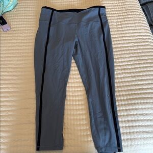 Blue athleta leggings with navy blue trim
